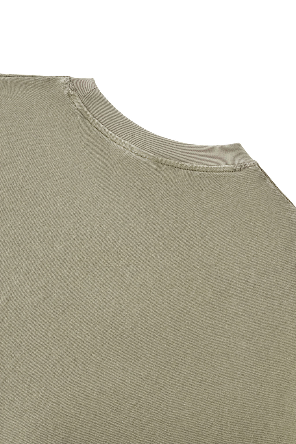 Back neckline detail of the Trini Born Culture Tee Arrival Edition highlighting reinforced ribbed collar construction, premium heavyweight cotton fabric, and quality craftsmanship designed for lasting wear.