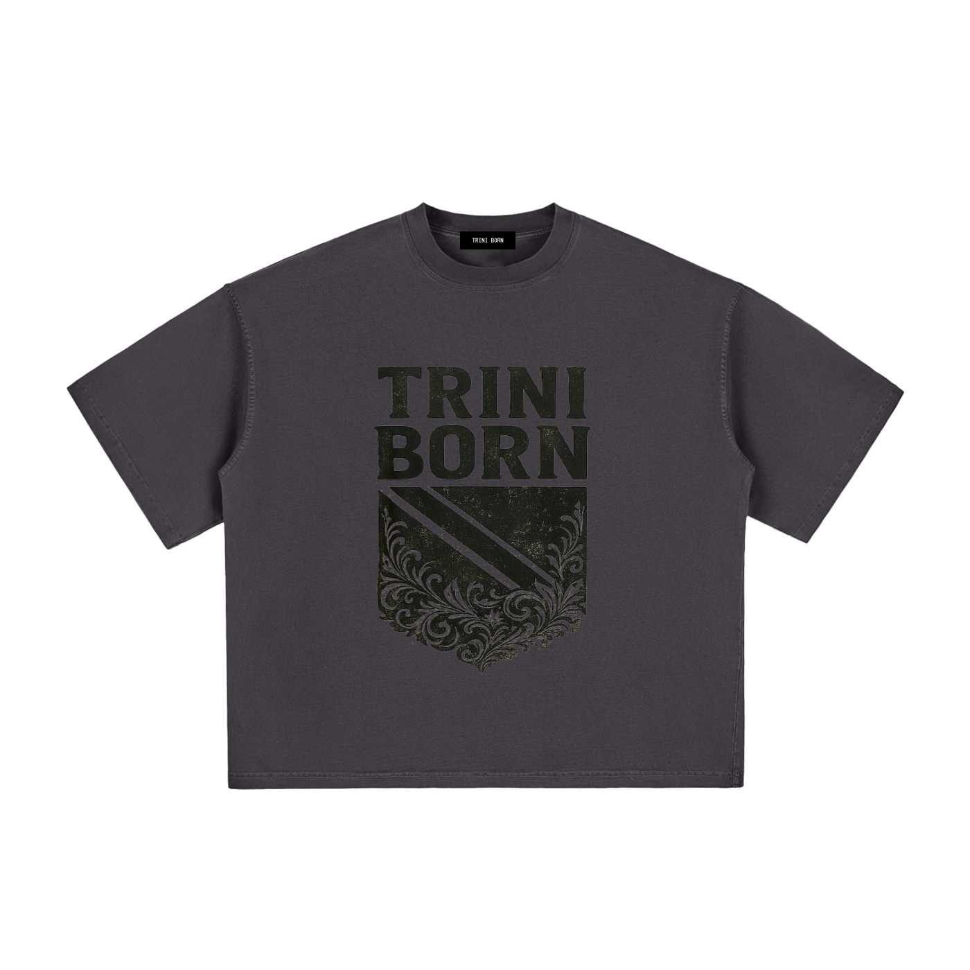 Trini Born Culture Tee Arrival Edition in charcoal featuring the signature Trinidad-inspired crest graphic on the front. Premium heavyweight 100% cotton oversized boxy fit unisex Caribbean streetwear designed for everyday wear.