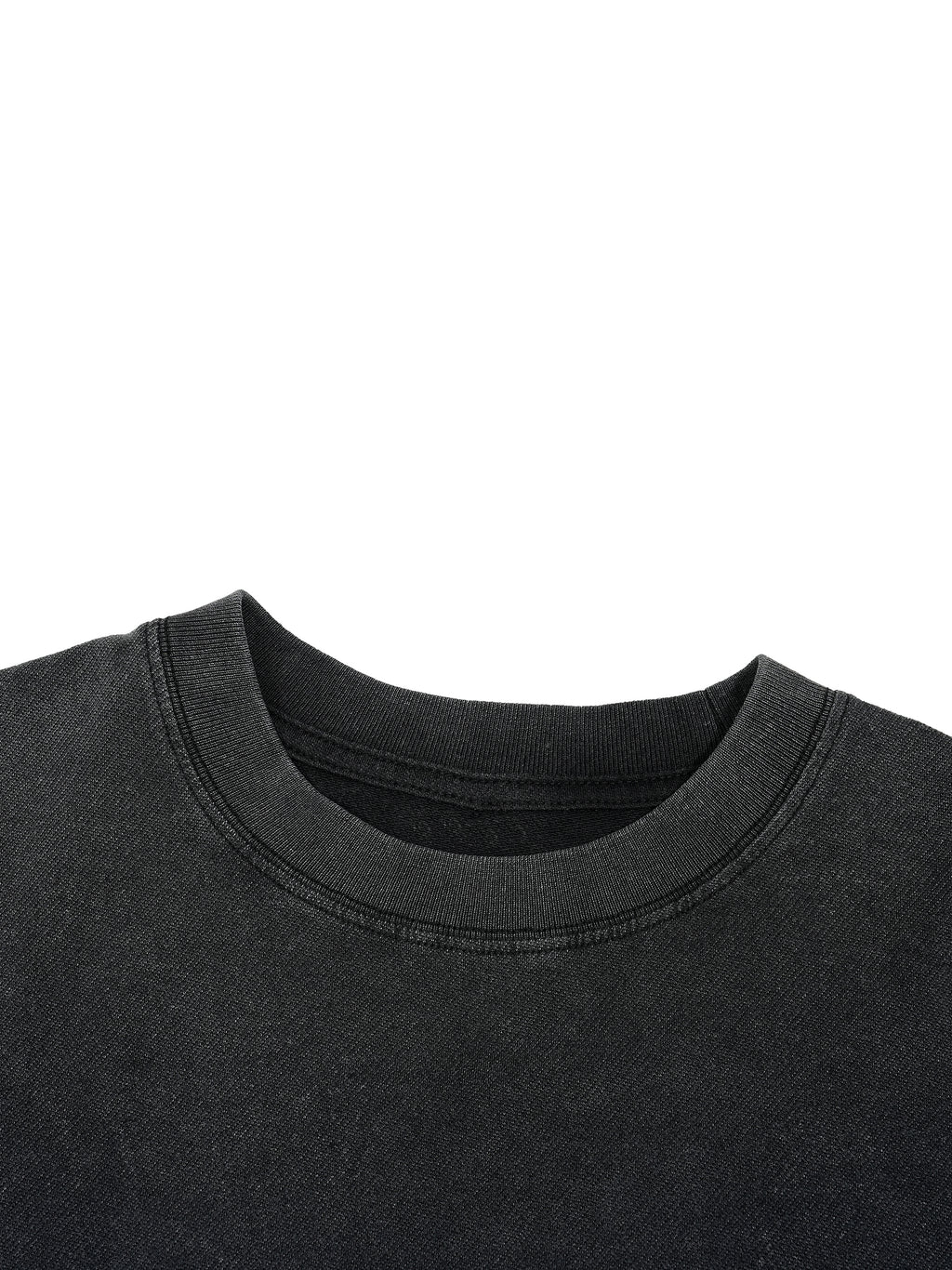 Crewneck collar detail on washed black Trini Born Culture Tee showing ribbed neckline and sturdy stitching