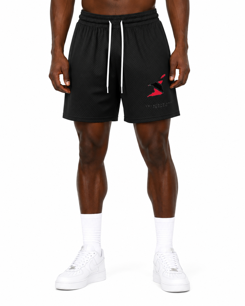 Trini Born black mesh shorts on model, back view with subtle Trini Born script detail.