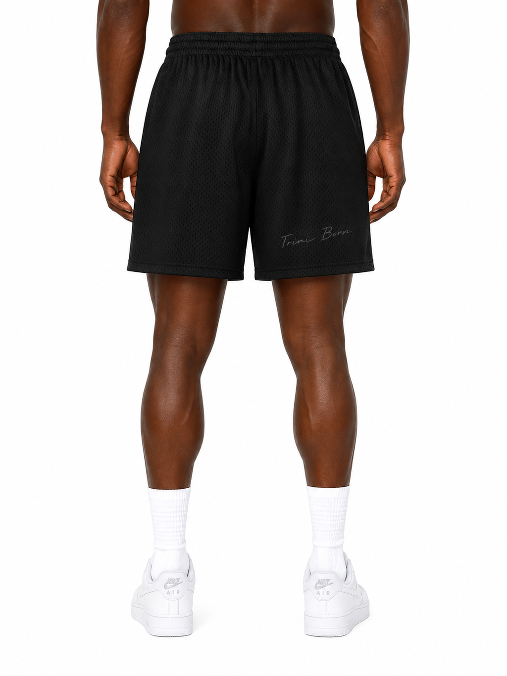 Close-up of Trini Born black mesh shorts showing breathable mesh, white drawstring and Trinidad and Tobago graphic.