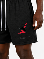 Trini Born black mesh shorts on model, front view with Trinidad and Tobago map graphic and white drawstring.