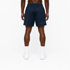 Trini Born navy mesh shorts on model, back view with subtle Trini Born script detail.