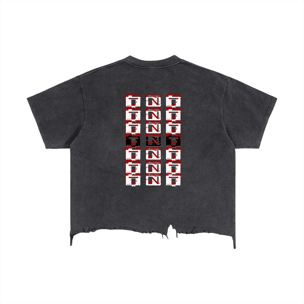 Trini Born Culture Tee in washed black back view, oversized cropped Trinidad streetwear shirt with TNT graphic in black white and red and raw hem.